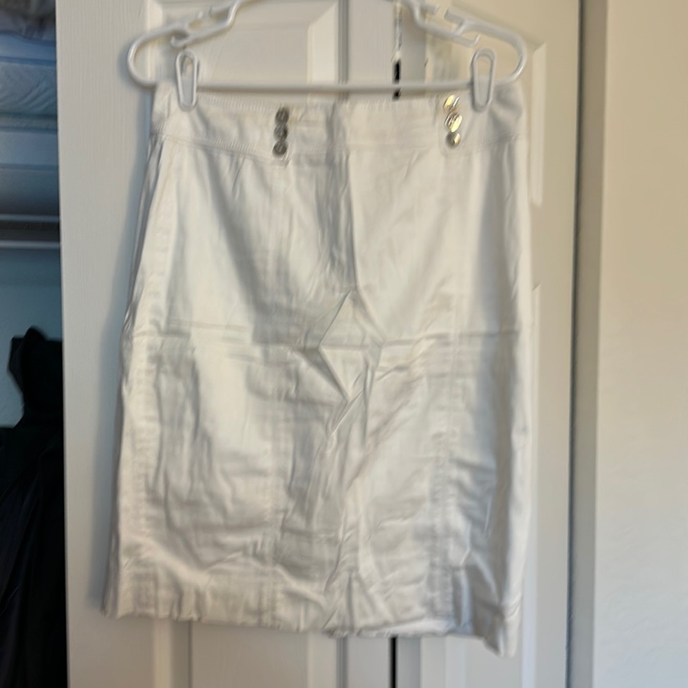 Worn, some stains might come out. Size 10 White House Black Market work skirt